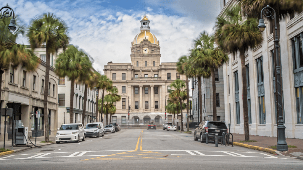 Palm-lined Bull Street leads toward Savannah City Hall and its gold dome.